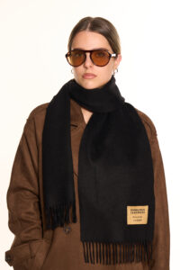 A black-colored cashmere scarf in a stylish premium box.