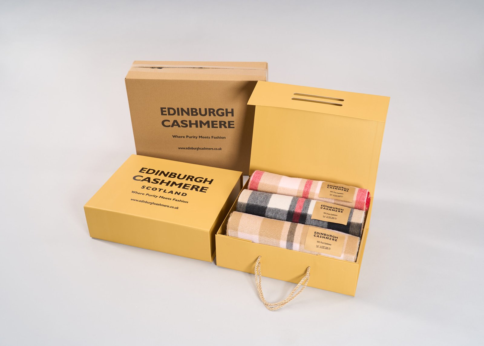 Edinburgh Cashmere exclusive gift box being opened by a recipient